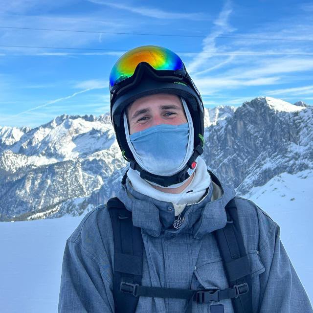 Ignacio snowboarding in the mountains
